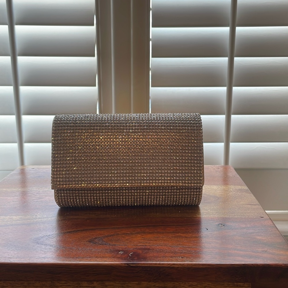 Crystal embellished clutch, can be worn with or without strap (included).